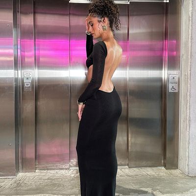 Une nouvelle chaude sexy, une robe à dos bas, une robe creuse, une longue manche, une poche à hanche, une robe de couleur.