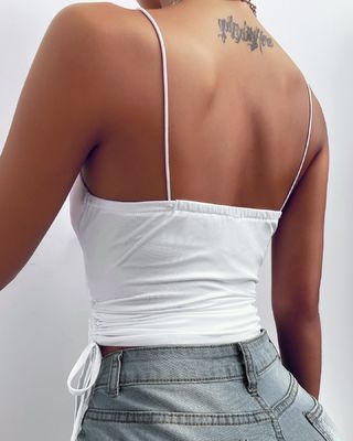 Des suspendus blancs étroits, sexy, de couleur solide, v-neck profond, camisole à la corde, gilet de sécurité.