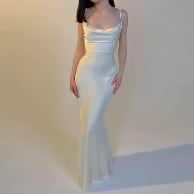 Tempérament d'été vent Europe et États-Unis nouvelle couleur solide épissage dentelle taille longue robe de bride mince