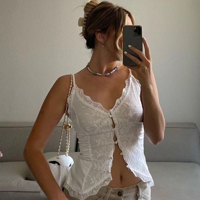 Le style féminin américain Spice Girl dentelle dentelle sexy V-col cardigan boucle habillage petit gilet haut